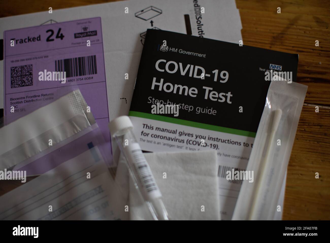 Uk government home testing kit for Covid 19 Stock Photo Alamy