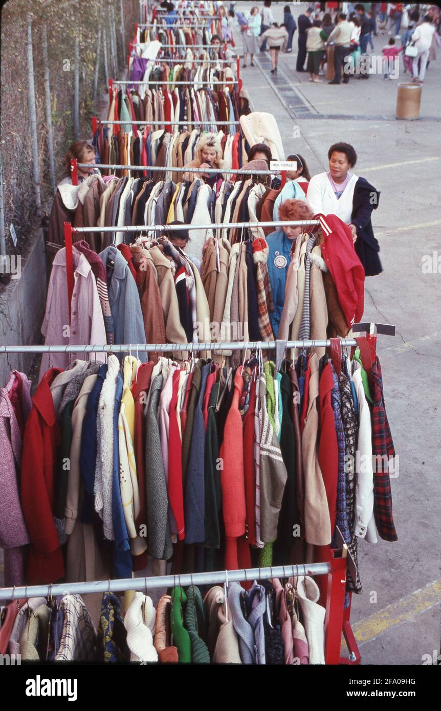 Volunteers help families shop for free coats during Goodwill