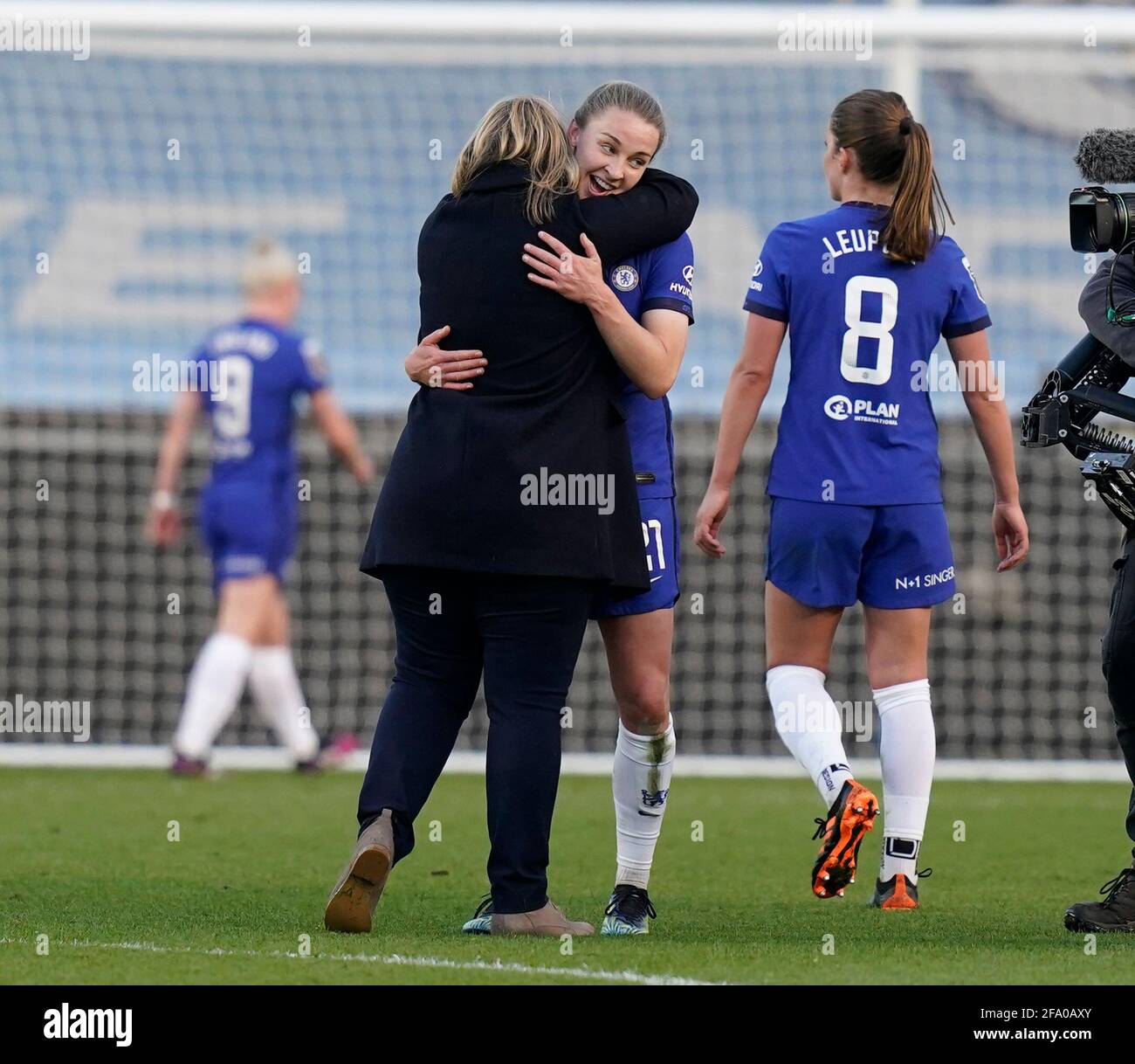 Manchester, England, 21st April 2021.  Emma Hayes manager of Chelsea hugs Niamh Charles of Chelsea  during the The FA Women’s Super League match at the Academy Stadium, Manchester. Picture credit should read: Andrew Yates / Sportimage Credit: Sportimage/Alamy Live News Stock Photo