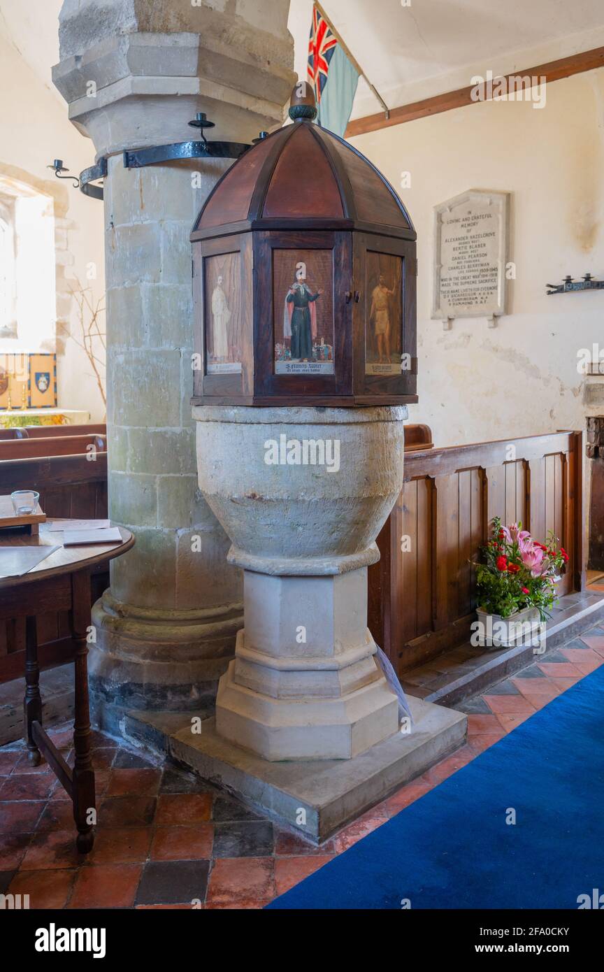 Marble Tub Font, likely C11 (11th century) made of Sussex Marble, in Saint Nicholas Church in Poling, West Sussex, England, UK. Stock Photo