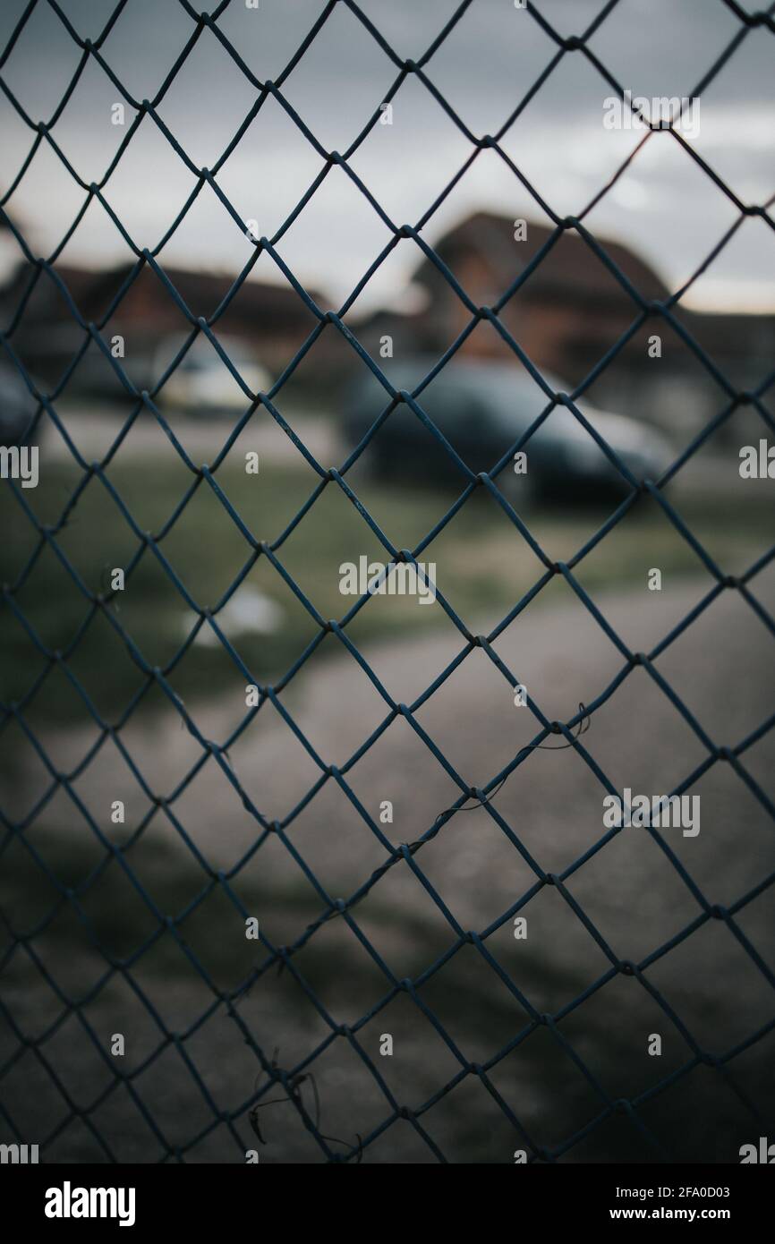 Closeup shot of a metal fence with mesh Stock Photo - Alamy