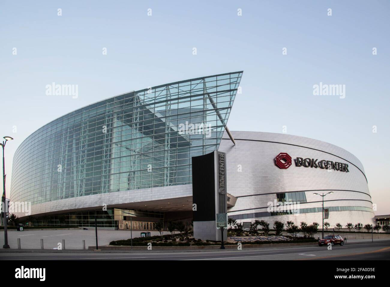 06013-2020 Tulsa USA BOK Center Sports and Entertainment venue showing wrap a round glass facade and entrance Stock Photo