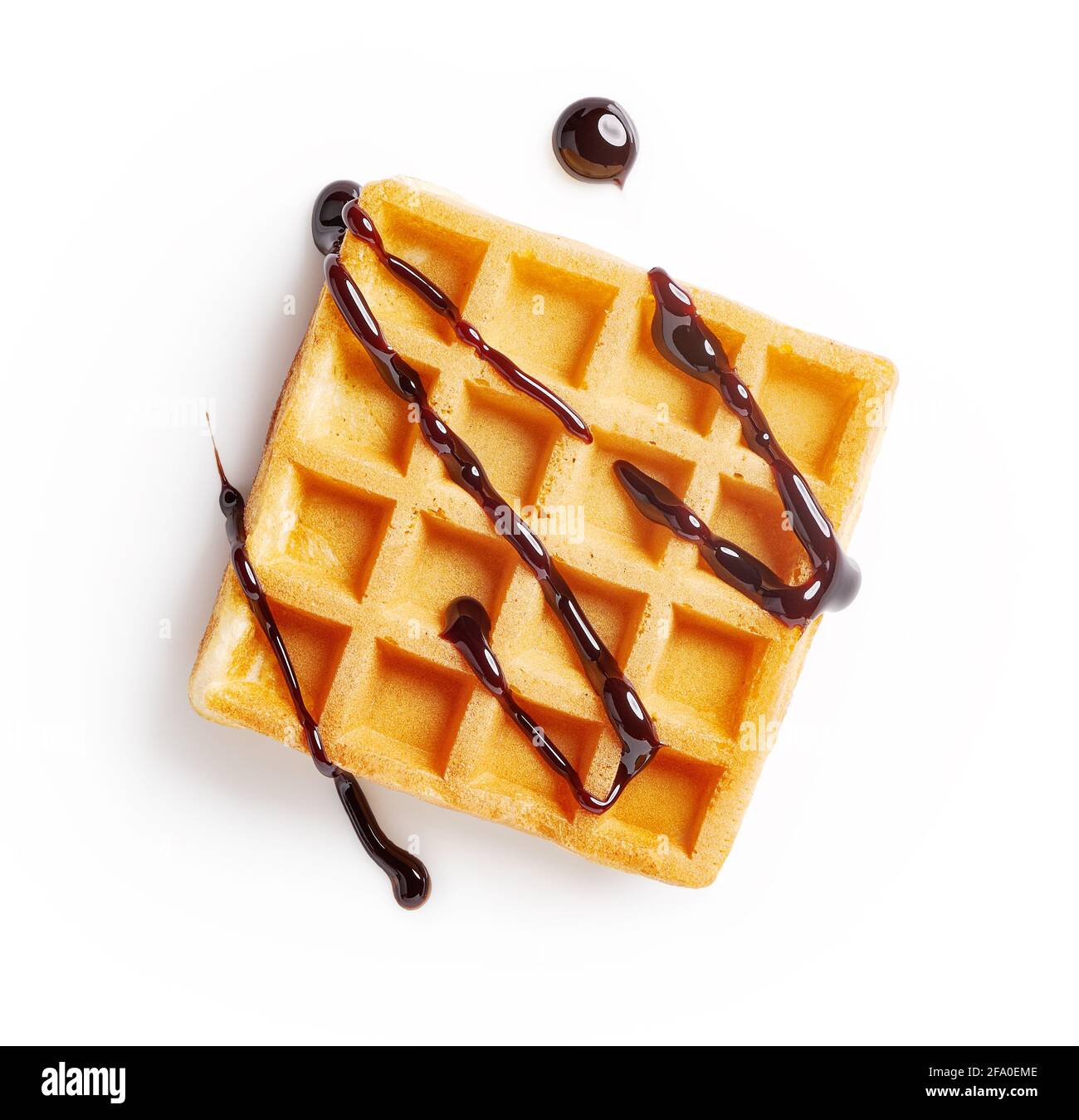Waffle with chocolate sauce isolated on white background. Top view of ...