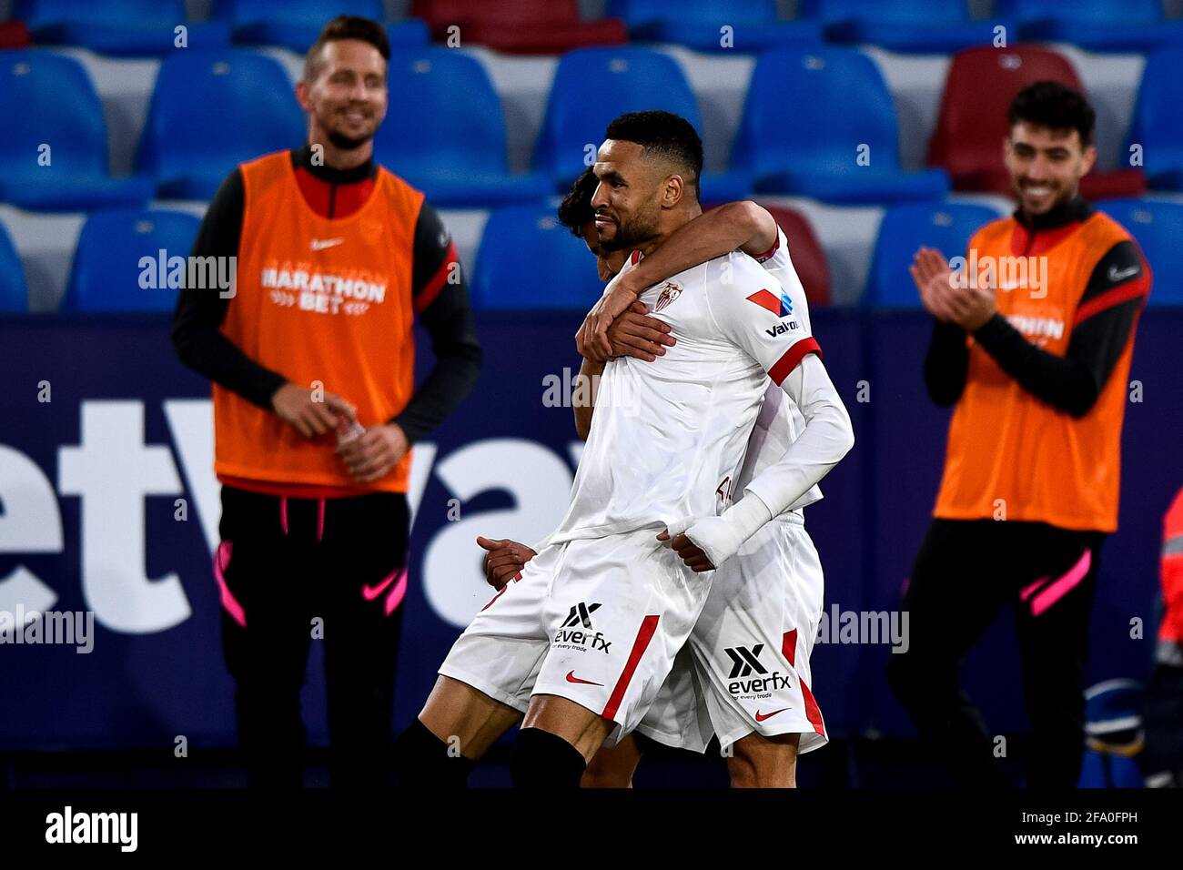 VALENCIA, SPAIN - APRIL 21: Youssef En-Nesyri of Sevilla FC celebrates with Jesus Navas of Sevilla FC after scoring his sides first goal during the La Stock Photo
