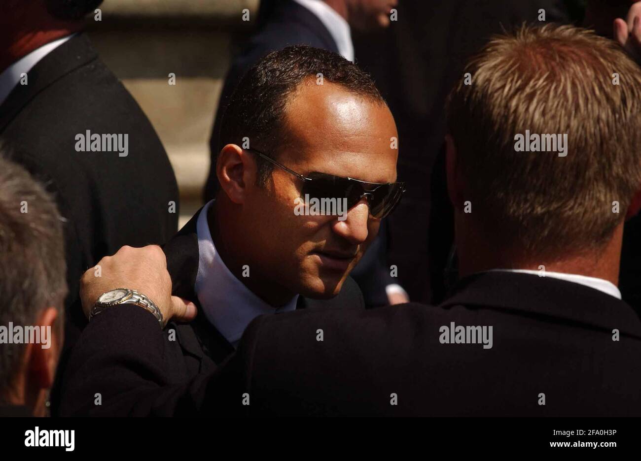 MARK BUTCHER  AFTER THE MEMORIAL SERVICE FOR THE CRICKETERS SURREY TEAMMATE  BEN  HOLLIOAK AT WHICH THE ENGLAND PLAYER SANG A SONG IN SOUTHWARK CATHEDRAL. 15/7/02 PILSTON Stock Photo