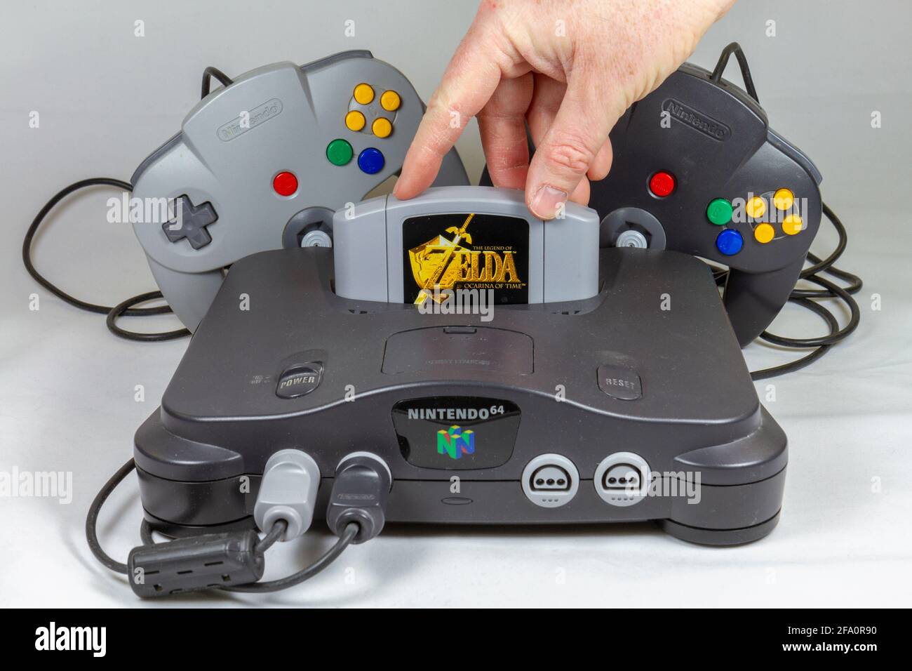 The Legend of Zelda: Ocarina of Time game in a Nintendo 64 or N64 video  game console, a fifth generation video game console launched in 1996 in  Japan Stock Photo - Alamy