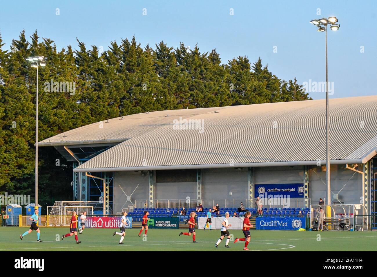 Cardiff, Wales. 21 April, 2021. Players on the field during the Welsh Premier Women's League match between Cardiff Met Women and Swansea City Ladies at the Cyncoed Campus in Cardiff, Wales, UK on 21, April 2021. Credit: Duncan Thomas/Majestic Media/Alamy Live News. Stock Photo