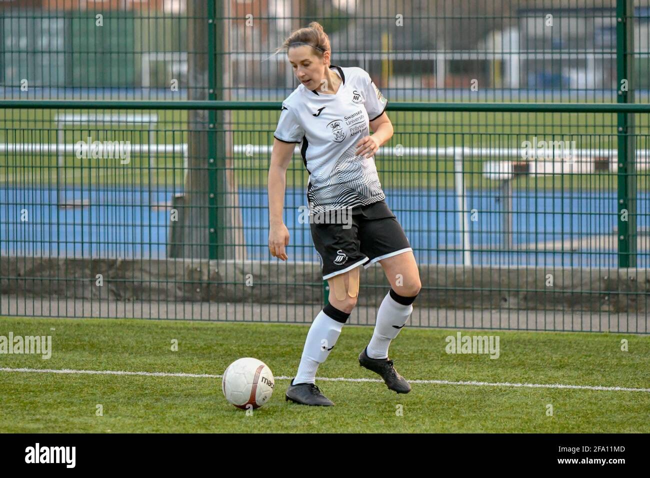 Cardiff, Wales. 21 April, 2021. Laura Davies of Swansea City Ladies during the Welsh Premier Women's League match between Cardiff Met Women and Swansea City Ladies at the Cyncoed Campus in Cardiff, Wales, UK on 21, April 2021. Credit: Duncan Thomas/Majestic Media/Alamy Live News. Stock Photo