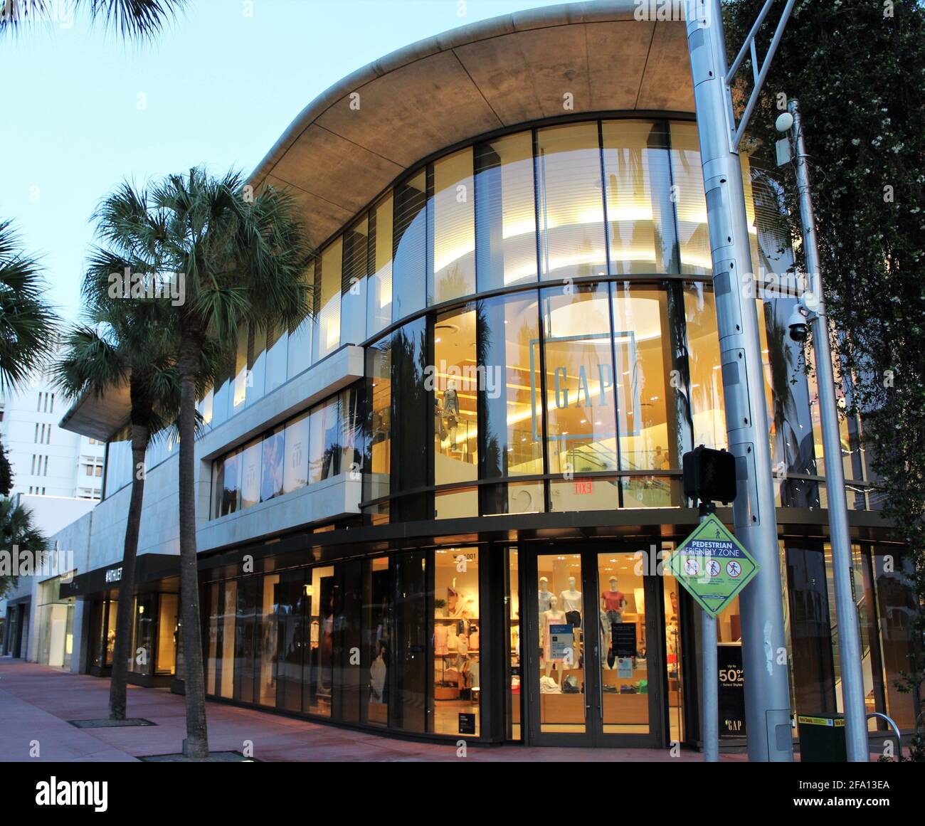 The GAP store at Lincoln Road Mall at sunrise. The Gap, Inc., commonly known as Gap Inc. is an American worldwide clothing and accessories retailer. Stock Photo