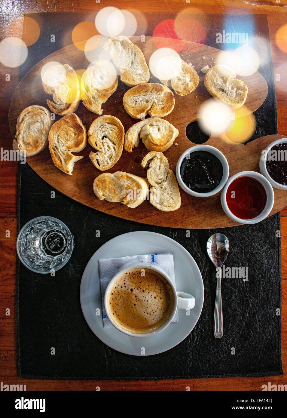 Coffee with milk and toast with jams Stock Photo Alamy
