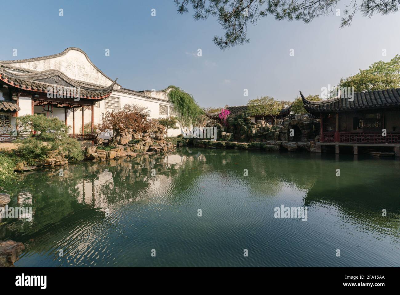 Landscape and buildings in Master of the Nets Garden, a classical Chinese garden in Suzhou, China Stock Photo