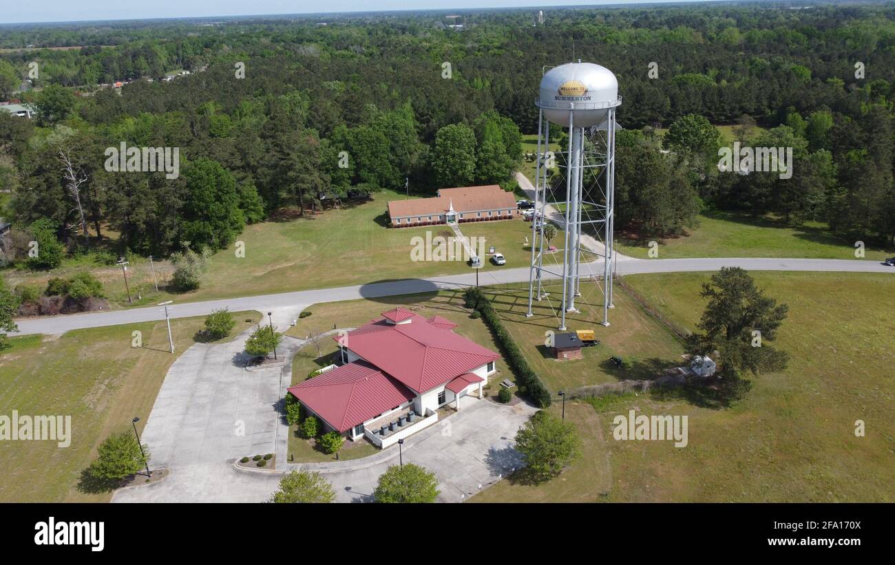 Aerial photo of Water Tower in Summerton, South Carolina on a sunny spring day taken by drone in