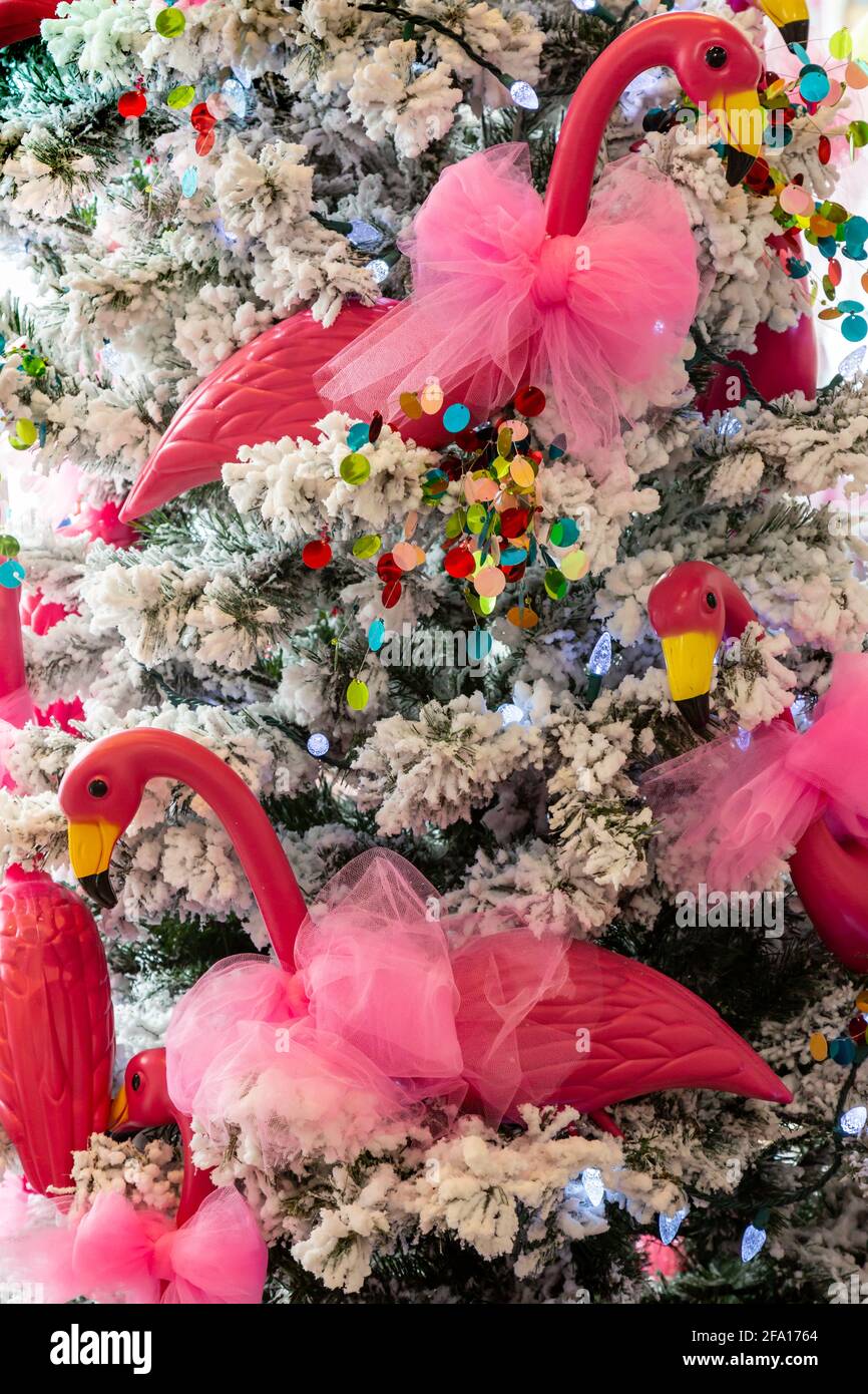 Plastic flamingos decorate a Christmas Tree in the Aphrodite Style store in  Stuart, Florida, USA Stock Photo - Alamy