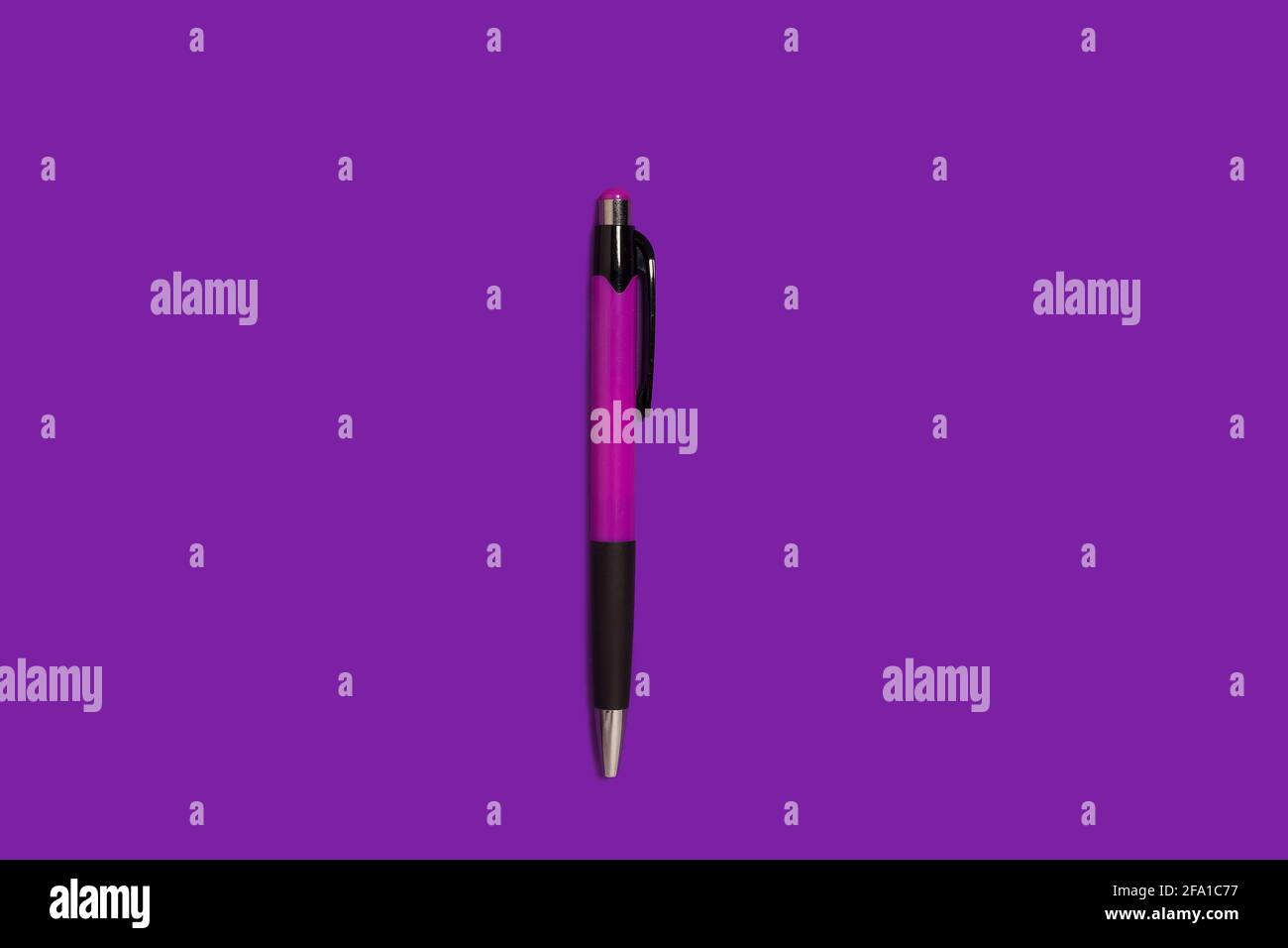 automatic pen lying on a purple background Stock Photo