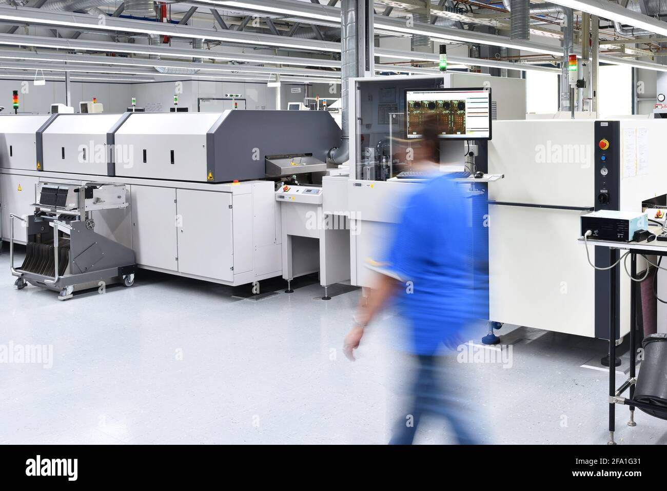 production plant in the modern industry - machines for the assembly of printed circuit boards in the electronics industry Stock Photo