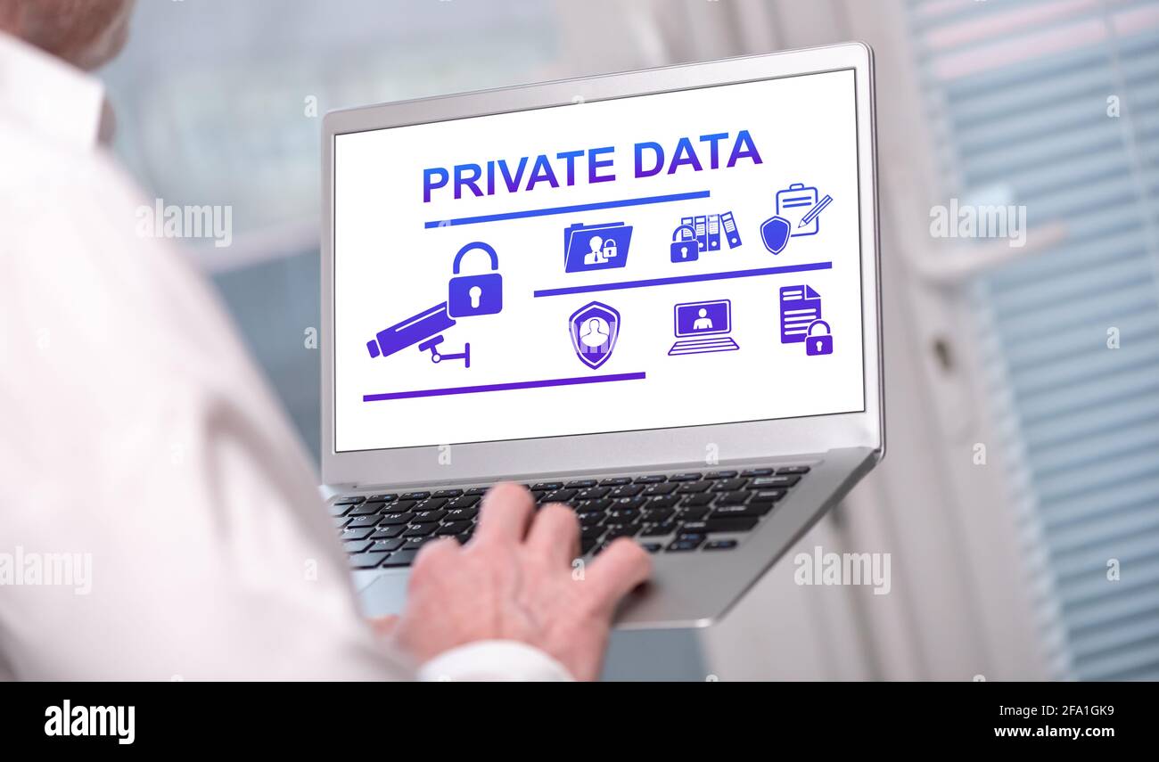 Private data concept shown on a laptop used by a man Stock Photo