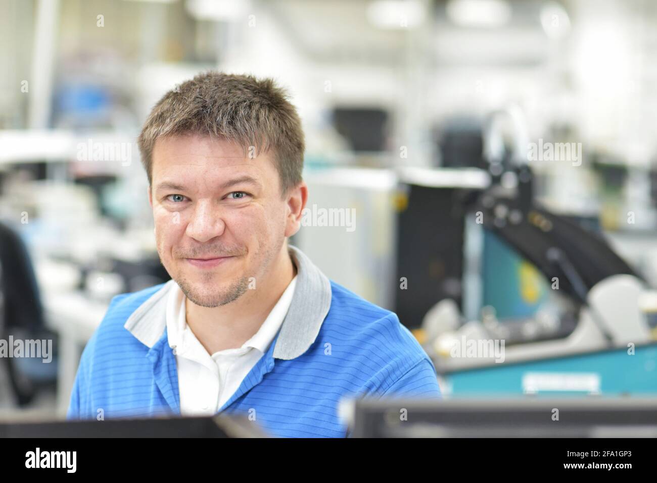 production of electronic components in a modern factory engineer at