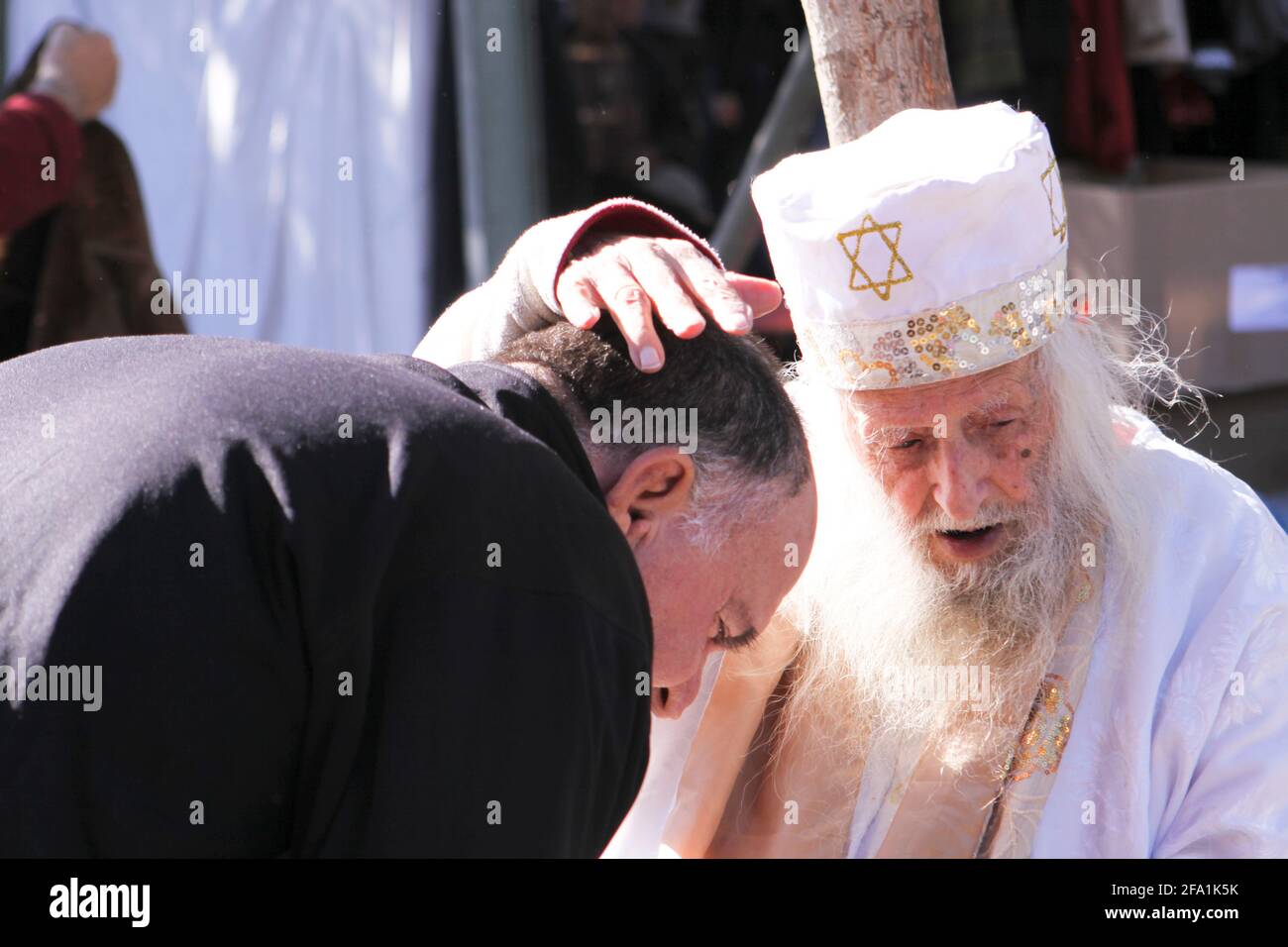 Jewish holy man blesses a believer The Prophet - Man inflicted with the Jerusalem Syndrome The Jerusalem syndrome is the name given to a group of ment Stock Photo