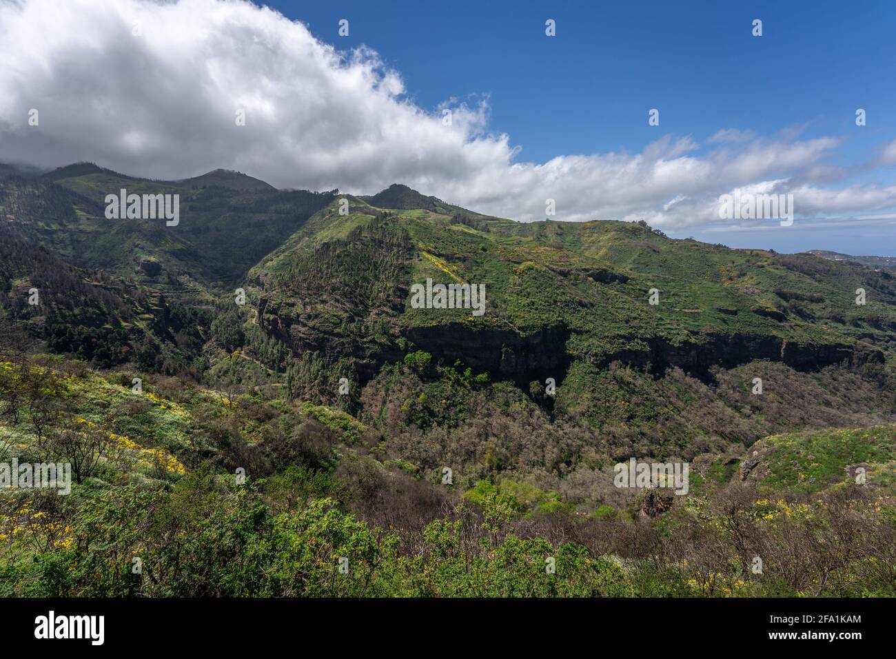 Rocky mountain under cloudy sky Stock Photo - Alamy
