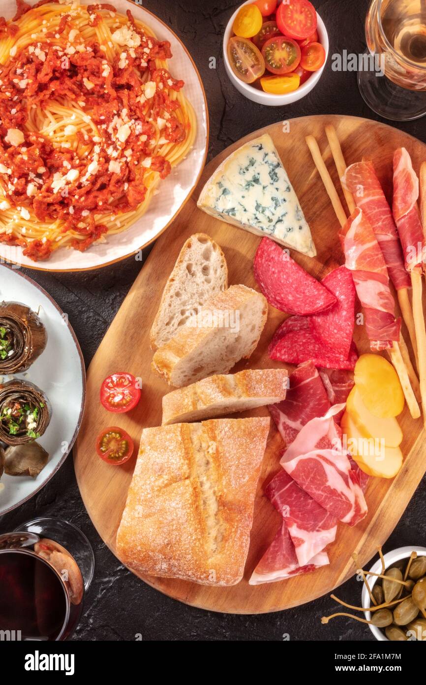 Italian food. Antipasti and pasta, top shot Stock Photo Alamy