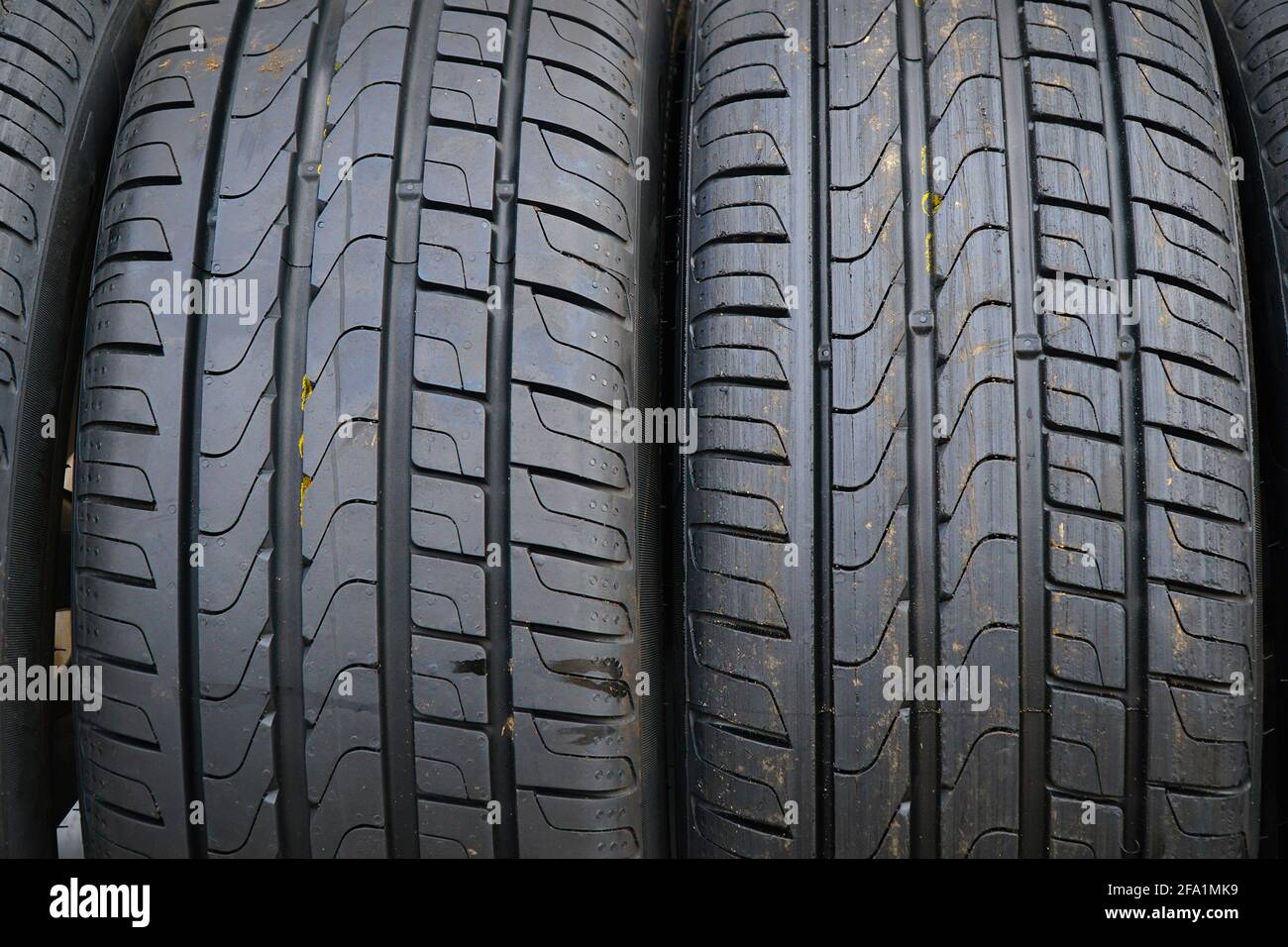 New black car tires closeup. Tire tread Stock Photo Alamy