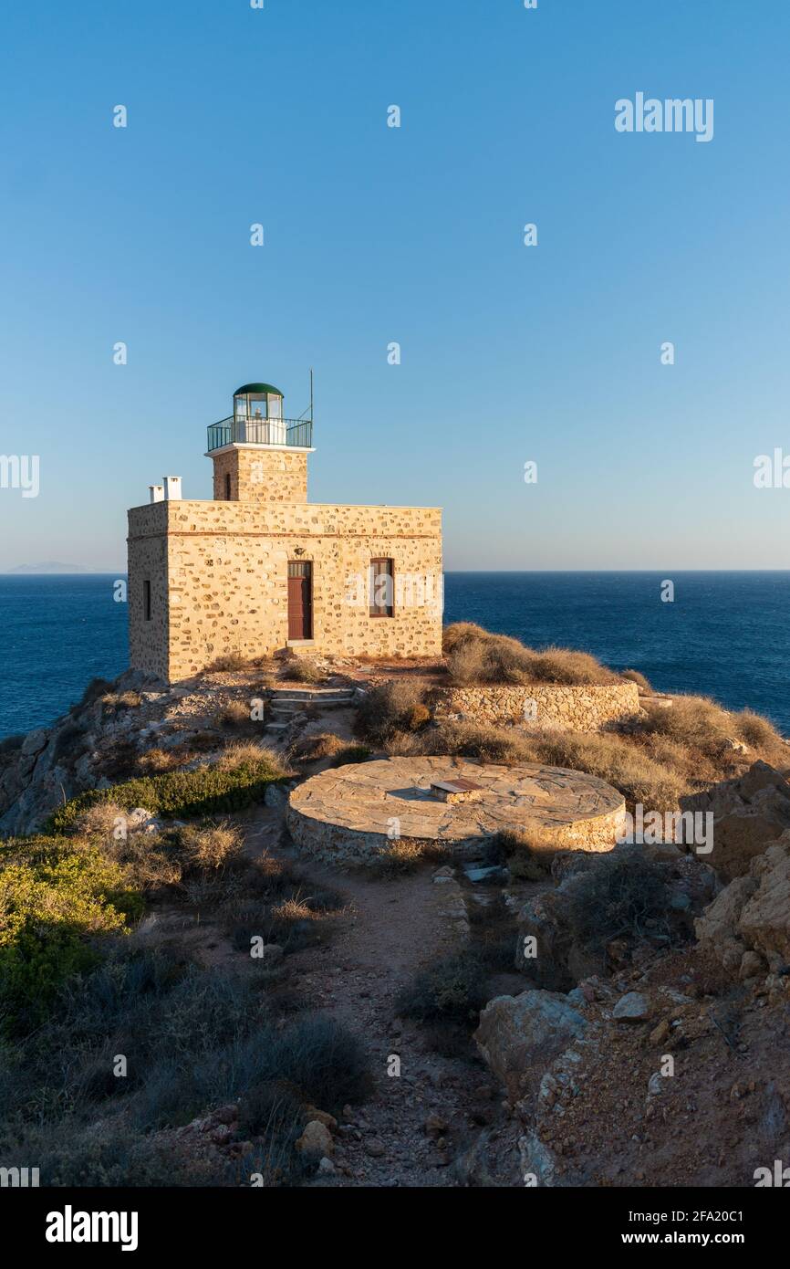 Lighthouse in the port in Ios , Greece Stock Photo