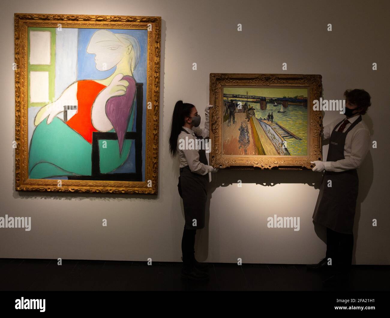 London, UK. 22nd Apr, 2021. 'Femme assise prs d'une fentre (Marie-Thrse)' By Pablo Picasso, estimated $55 Million with 'Le Pont de Trinquetaille' by Vincent Van Gogh estimated $25-35 Million. Highlights from the New York Spring season of Evening sales. Credit: Mark Thomas/Alamy Live News Stock Photo
