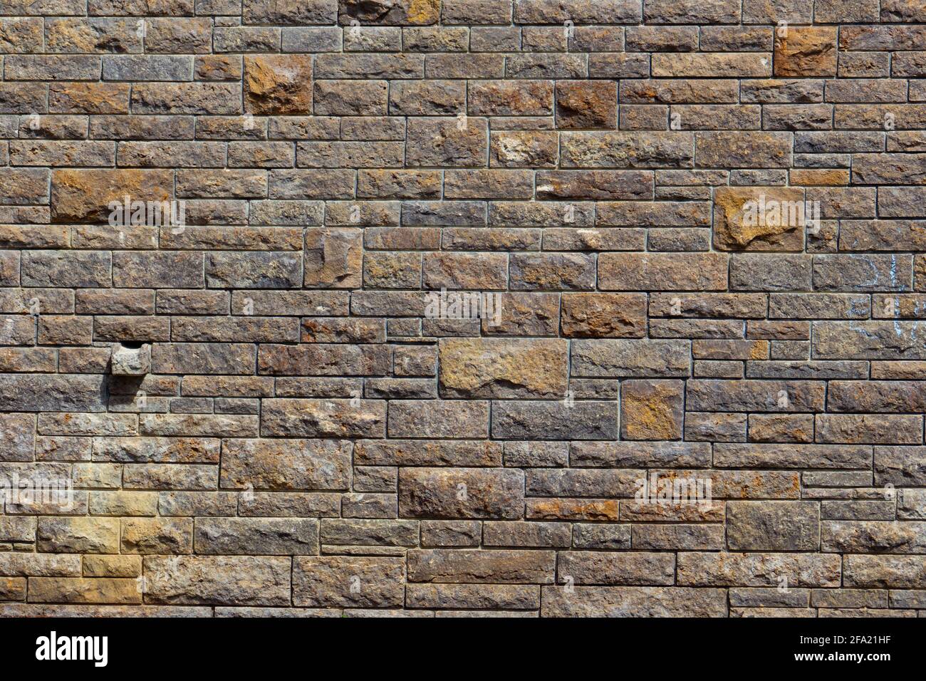 Natural brown and beige stone brick wall background texture Stock Photo ...