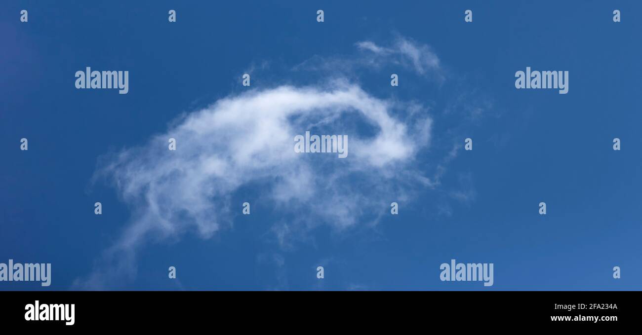 White cloud on a blue sky background. Stock Photo