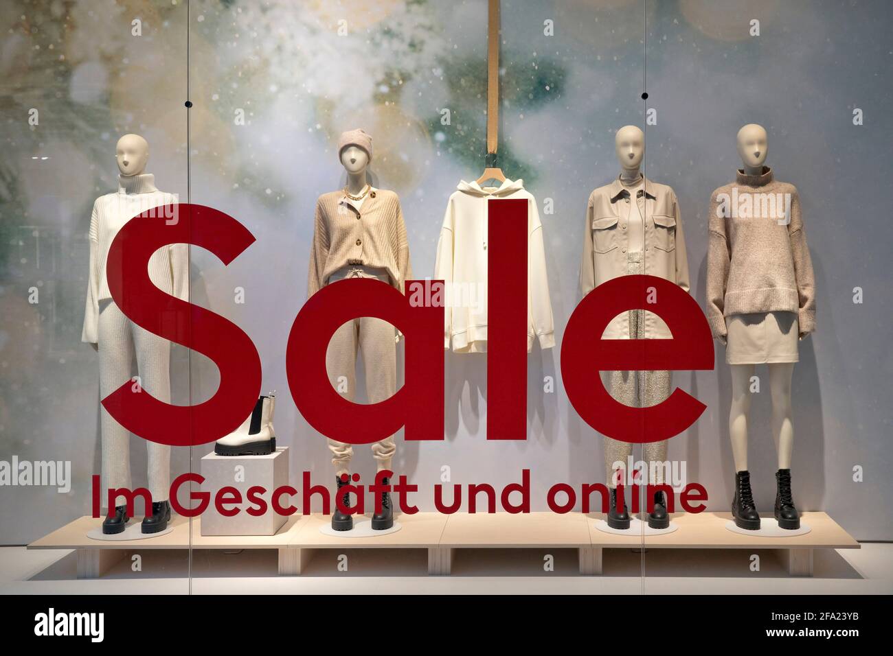 shop window of a clothing store with the inscription Sale, Germany