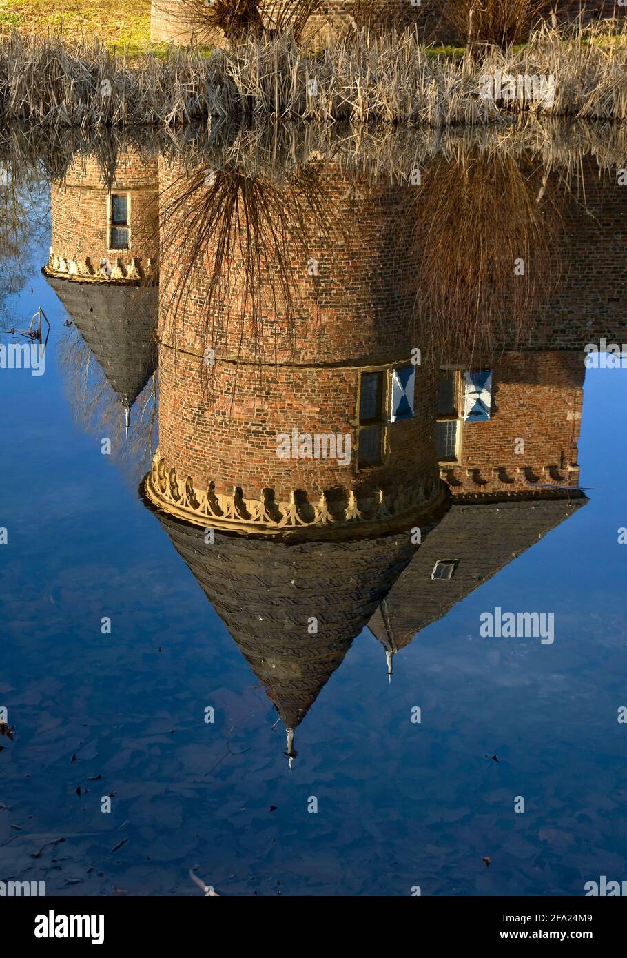 towers of Vondern Castle reflected in the water, Germany, North Rhine-Westphalia, Ruhr Area, Oberhausen Stock Photo