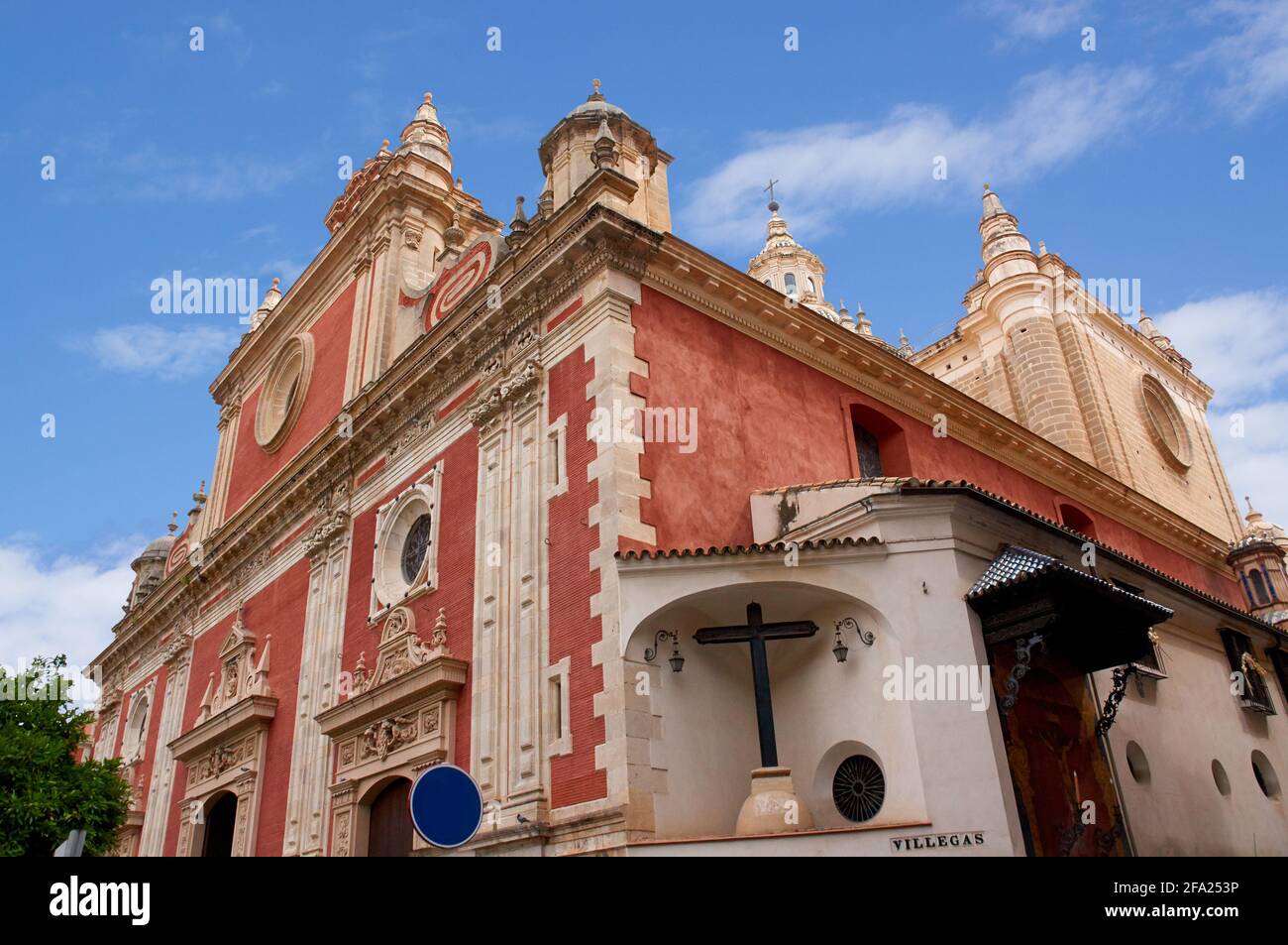 Historic buildings and monuments of Seville, Spain. Architectural details, stone facade and museums Europe. Spanish architectural. Iglesia Colegial Sa Stock Photo