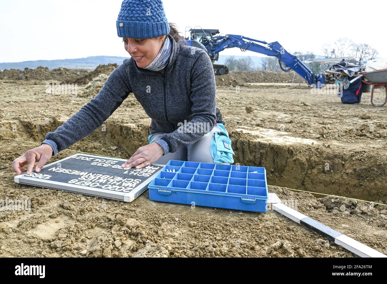 22 April 2021, Baden-Wuerttemberg, Wahlwies Bei Stockach: Archaeology student Rocío Herrera documents an excavation site that contains Bronze Age artifacts. Photo: Felix Kästle/dpa Stock Photo