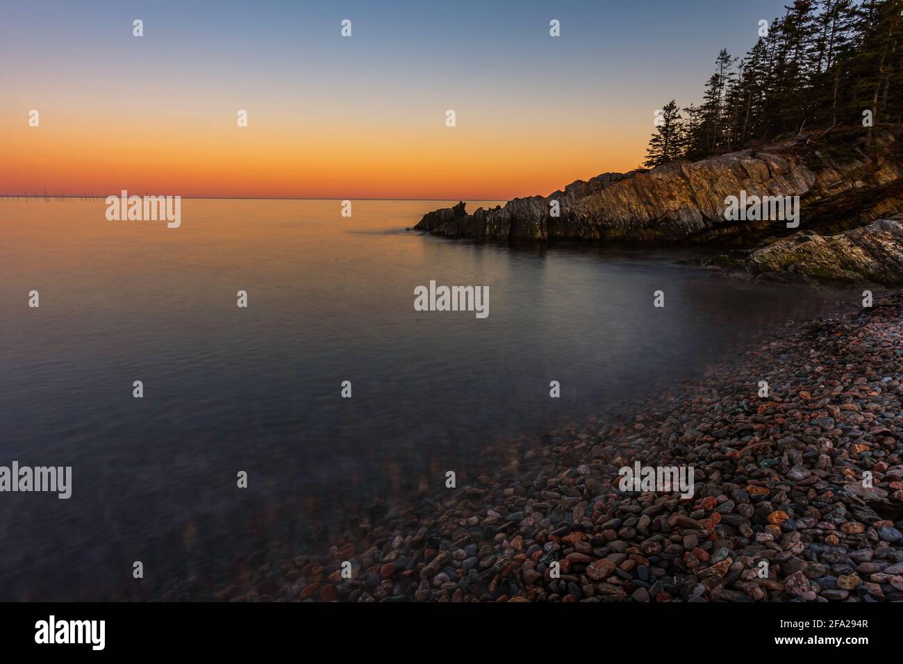 Rocky shore with sunset hi-res stock photography and images - Alamy