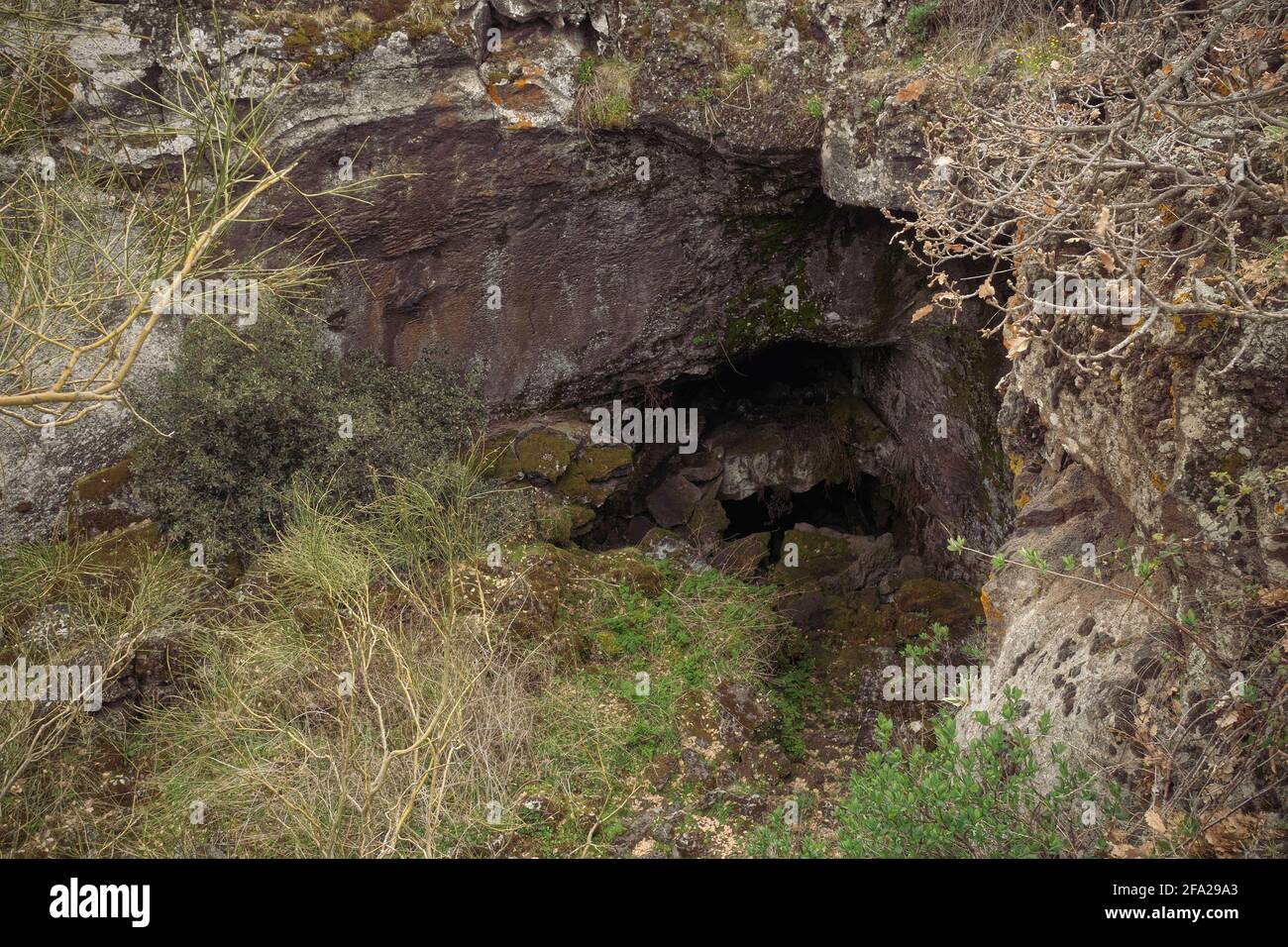 nature outdoor tourism destination in Sicily the entrance to the cave of Mount Intraleo in Etna Park Stock Photo