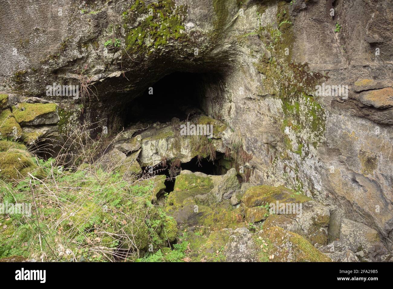 nature outdoor tourism destination in Sicily the entrance to the cave of Mount Intraleo in Etna Park Stock Photo