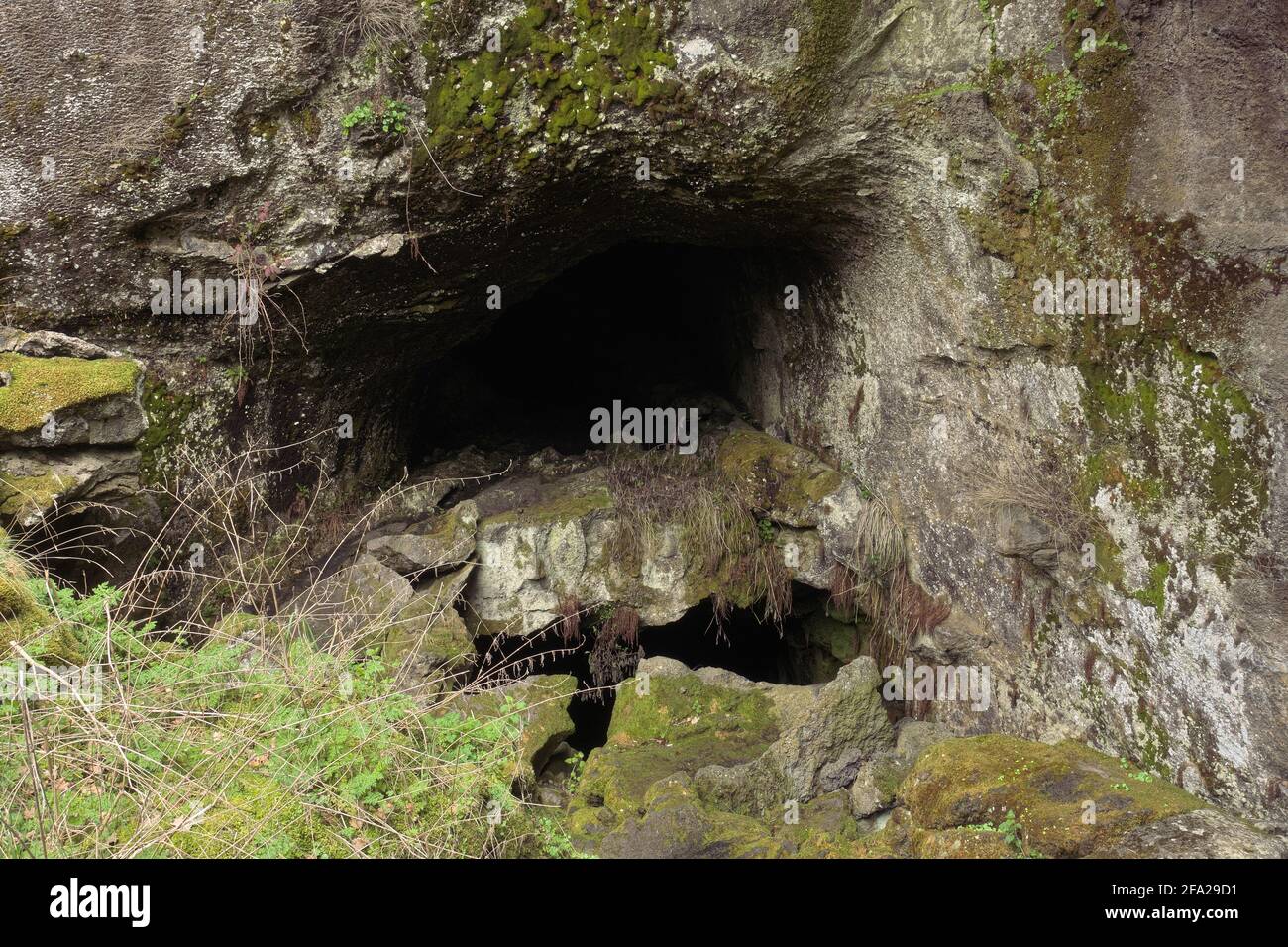 nature outdoor tourism destination in Sicily the entrance to the cave of Mount Intraleo in Etna Park Stock Photo