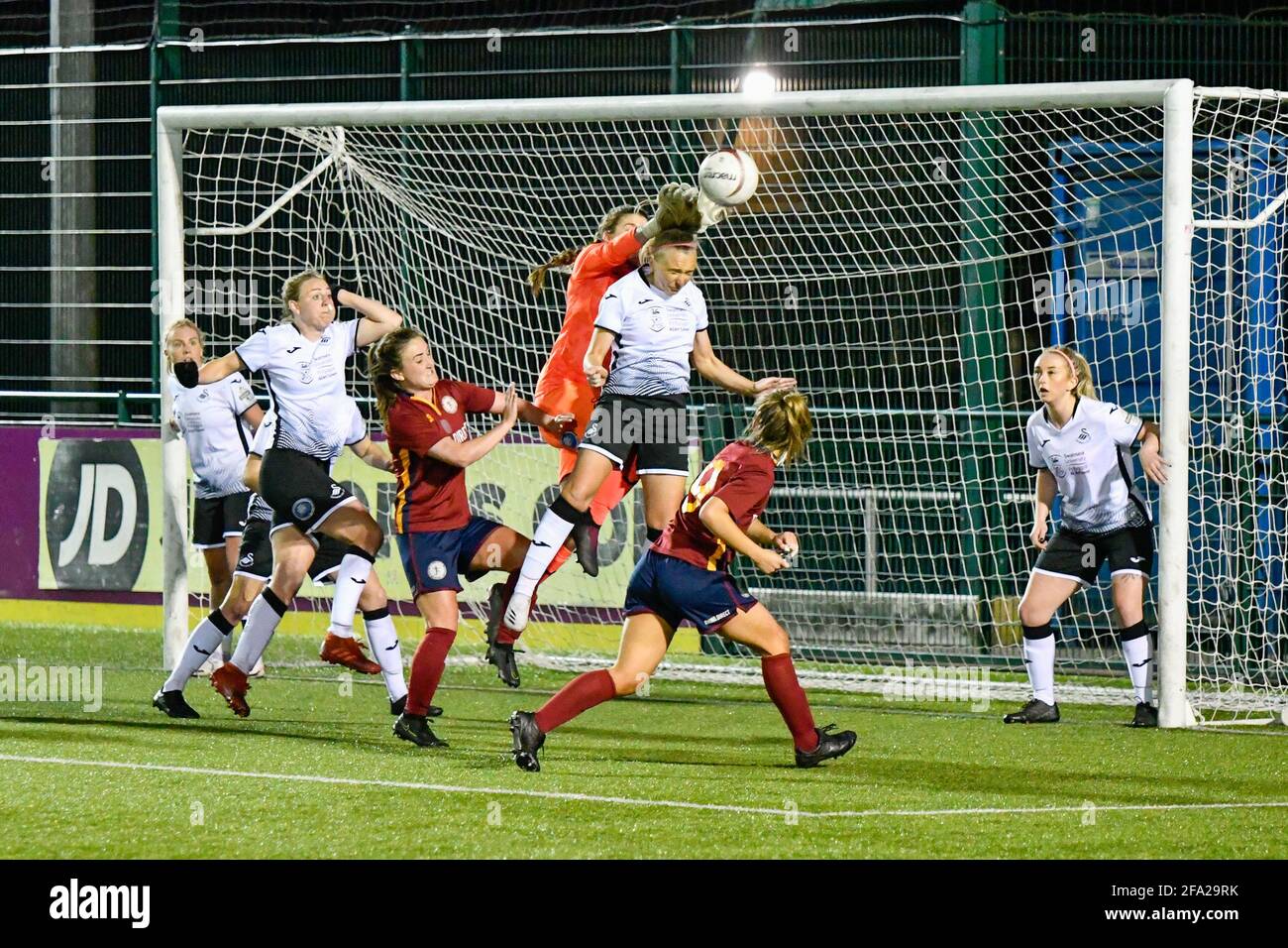 Cardiff, UK. 21st Apr, 2021. Claire Skinner of Swansea City Ladies punches the ball away during the Welsh Premier Women's League match between Cardiff Met Women and Swansea City Ladies at the Cyncoed Campus in Cardiff, Wales, UK on 21, April 2021. Credit: Duncan Thomas/Majestic Media/Alamy Live News. Stock Photo