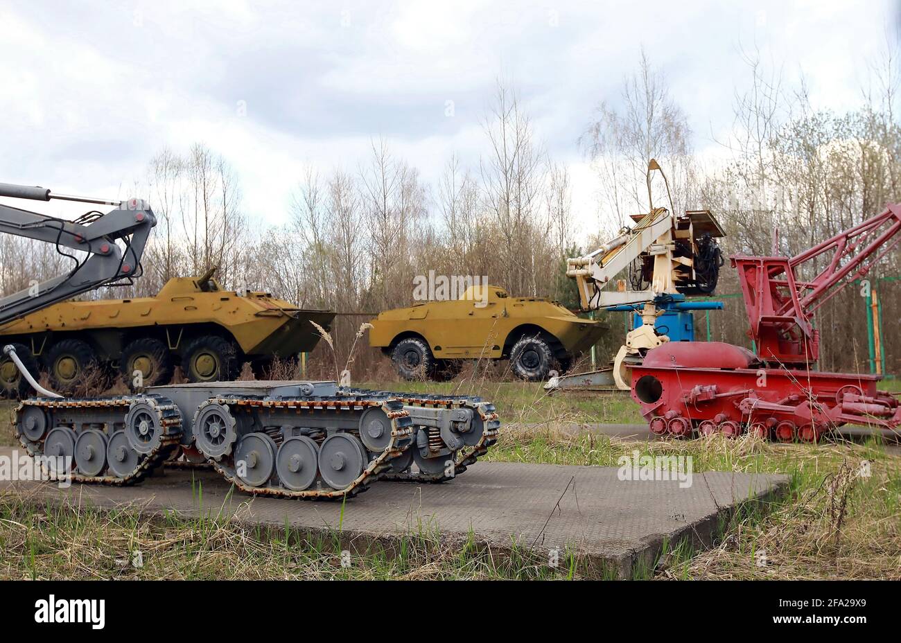 CHORNOBYL, UKRAINE - APRIL 21, 2021 - A Komatsu D-355W bulldozer and a  Soviet Mobot Ch-KhV-2 robot are displayed at the exhibition of equipment  used i Stock Photo - Alamy