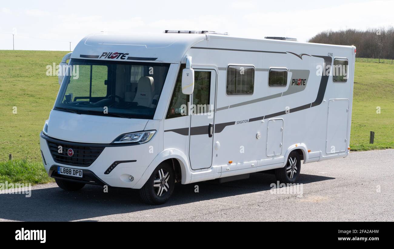 A 7.5 metre Pilote motorhome parked up in a lay-by whilst out on a trip. Stock Photo