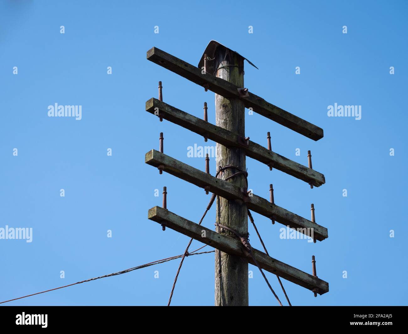 A disused telegraph pole trackside in Wiltshire, England, UK. Stock Photo