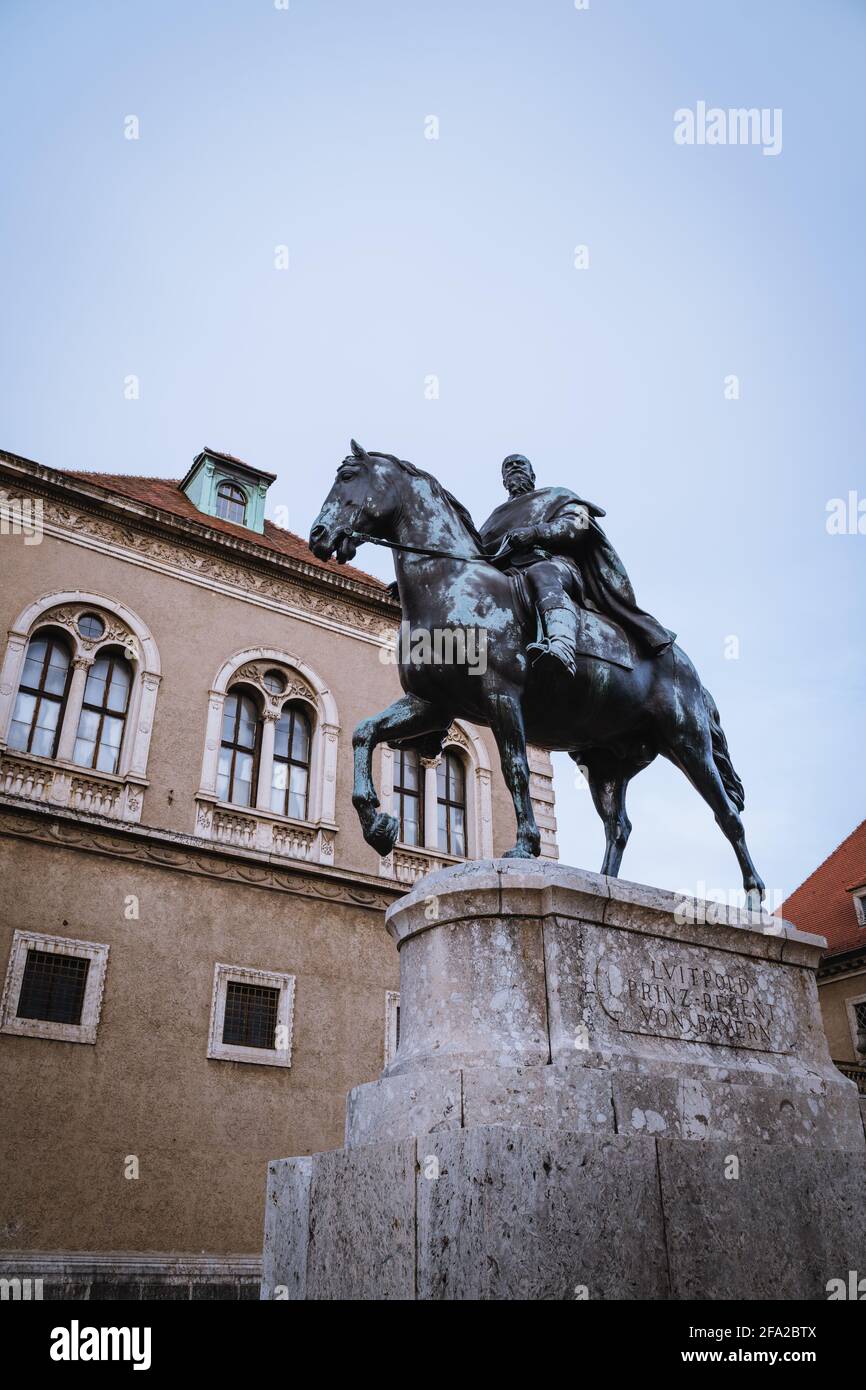 The bavarian national museum (art and culture gallery) in the city Munich. Constructed in 1900. A bronze rider statue stands in front of the building. Stock Photo