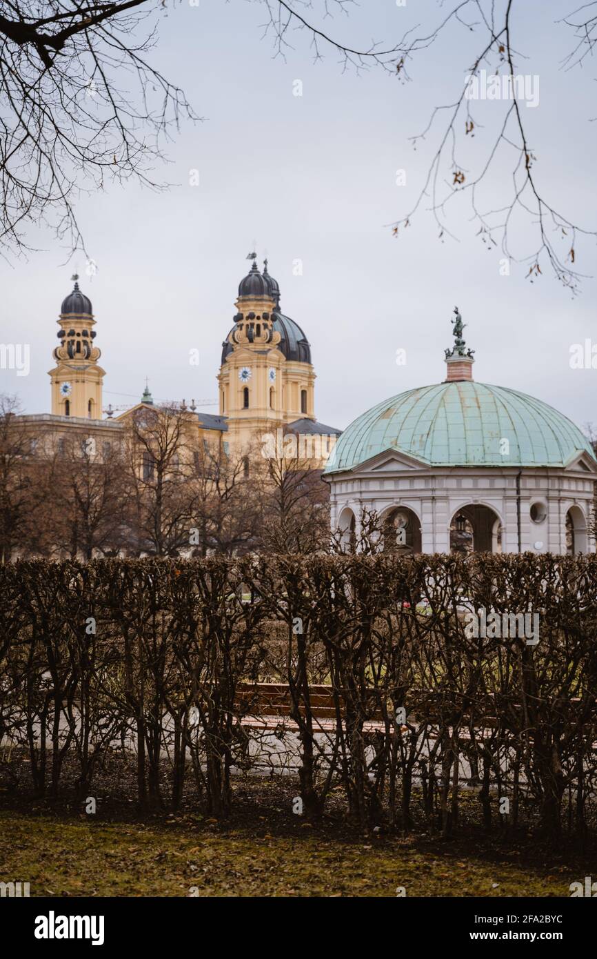 the Hofgarten and the Theatinerkirche in Munich, Bavaria, Germany. Symmetric pavillon with round green iron roof. Picture is made in autumn. Stock Photo