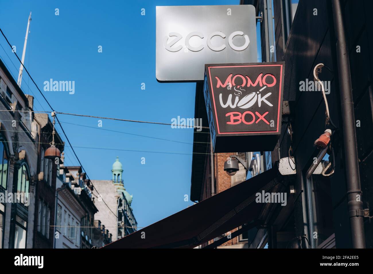 Copenhagen, Denmark - September 14, 2020. ECCO brand shop and Momo wok box  asian restaurant on shopping street in Copenhagen Stock Photo - Alamy