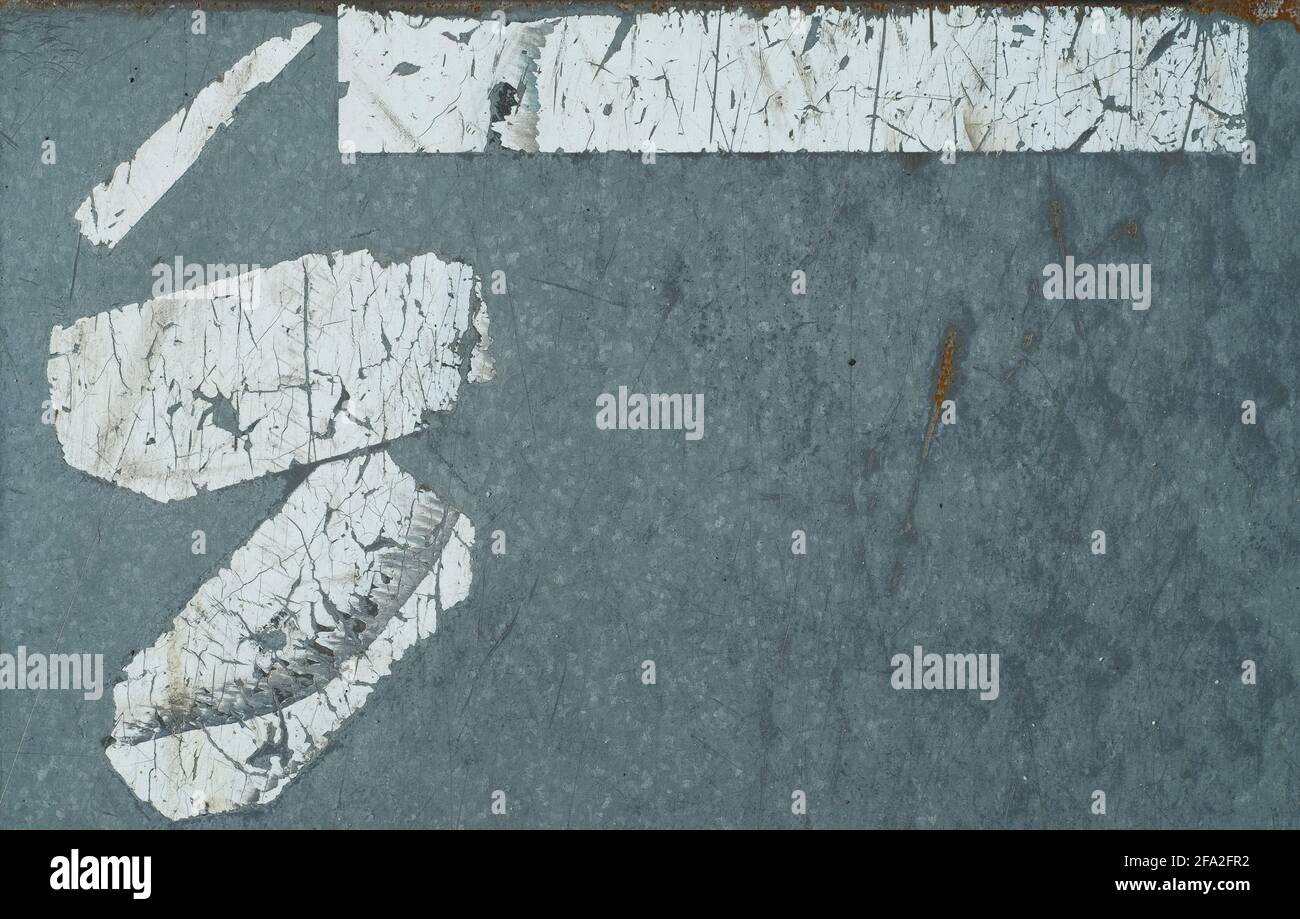 Industrial style background or template with torn empty adhesive stickers, free copy space Stock Photo