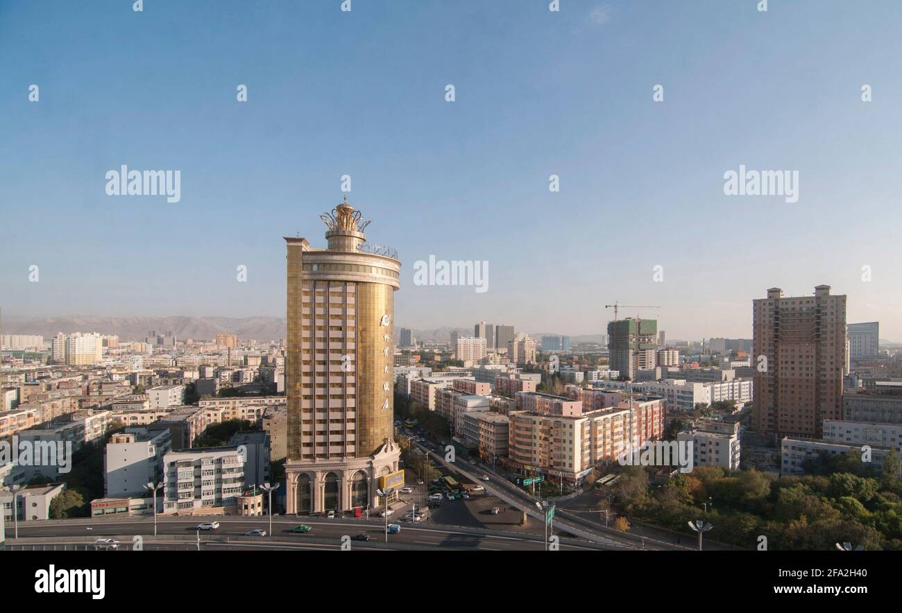 Aerial view of the skyline with offices, residential high rise buildings and skyscrapers of the central district of Jiefang in Urumqi in Xinjiang, China, PRC.  © Time-Snaps Stock Photo