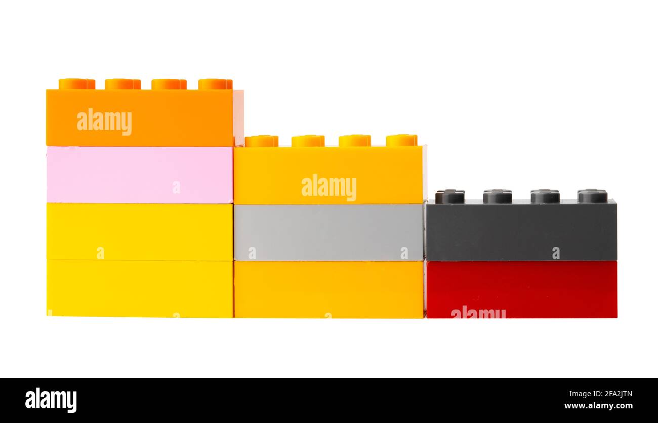 Colorful plastic toy building blocks isolated on white Stock Photo - Alamy
