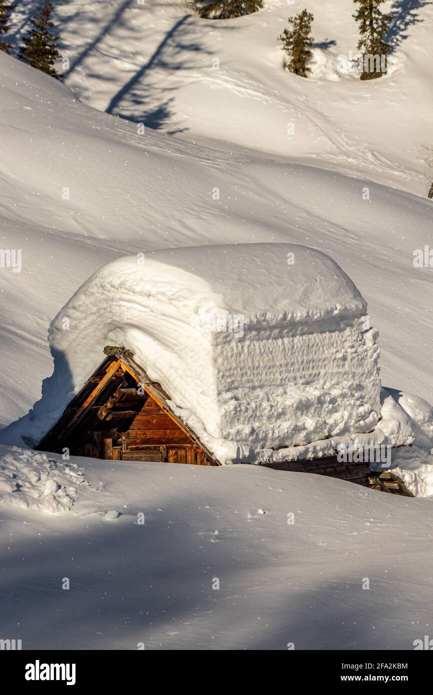 Mountain hut covered in snow Stock Photo - Alamy