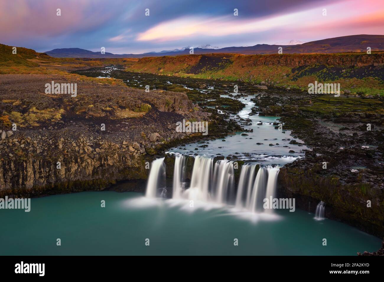 Thjofafoss waterfall in Iceland at colorful sunset Stock Photo