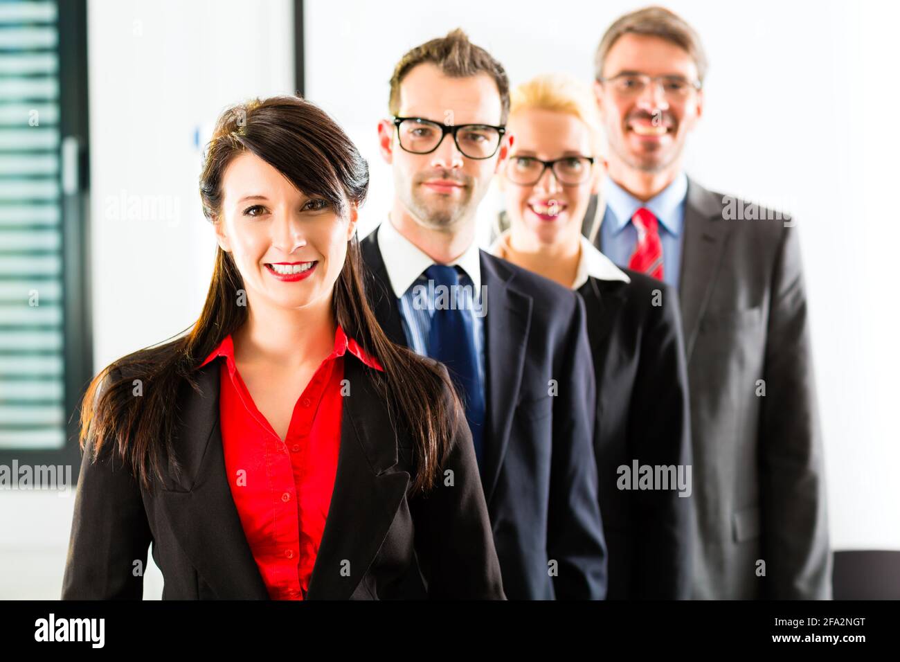 Business - group of successful businesspeople posing for group photo in ...